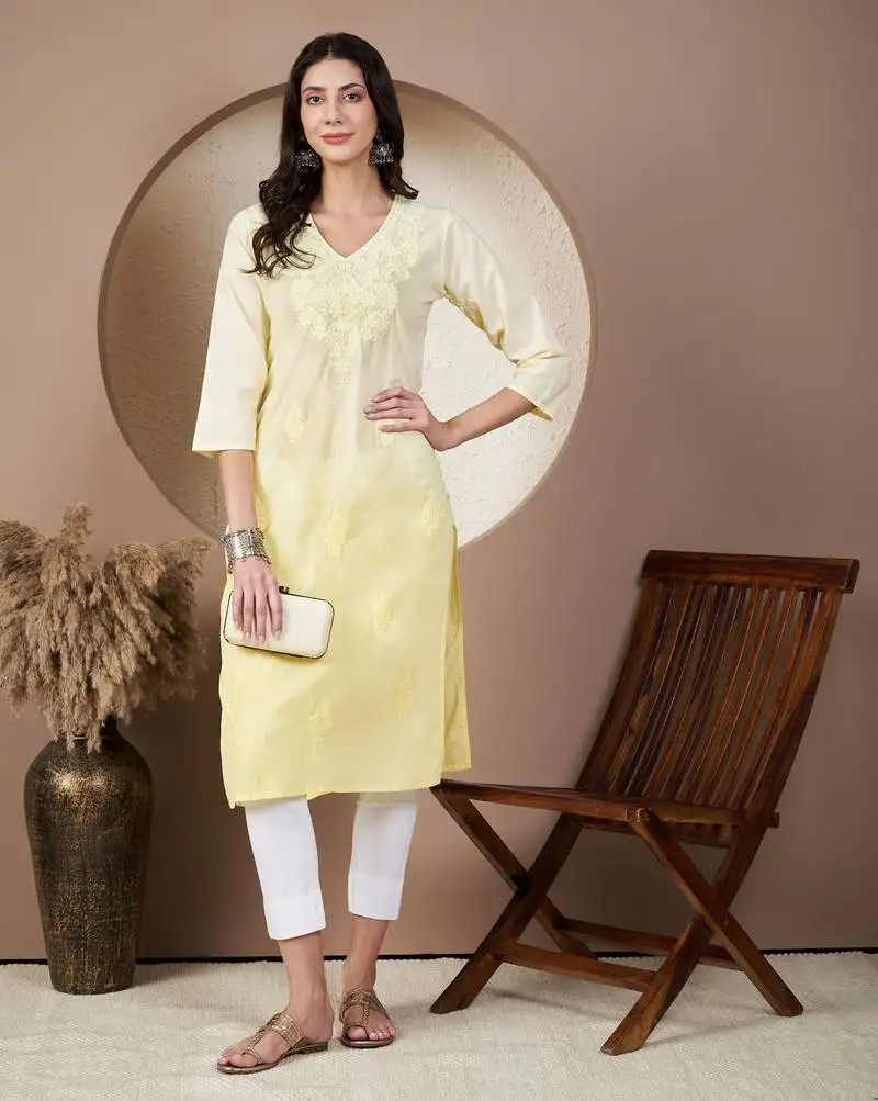 Women yellow chikankari kurti with white pant