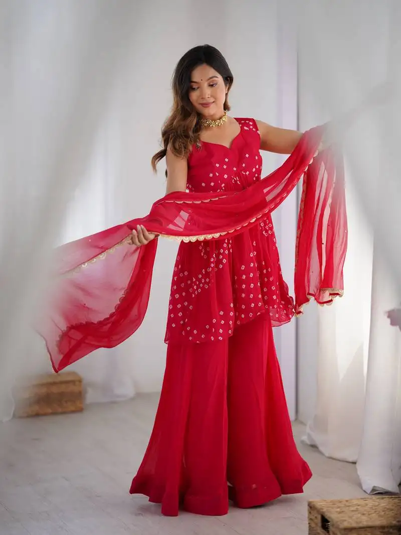 Crimson pink peplum kurta and flared palazzo set with dupatta stitched