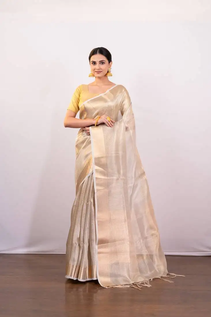 Golden beige tissue art silk saree with golden border