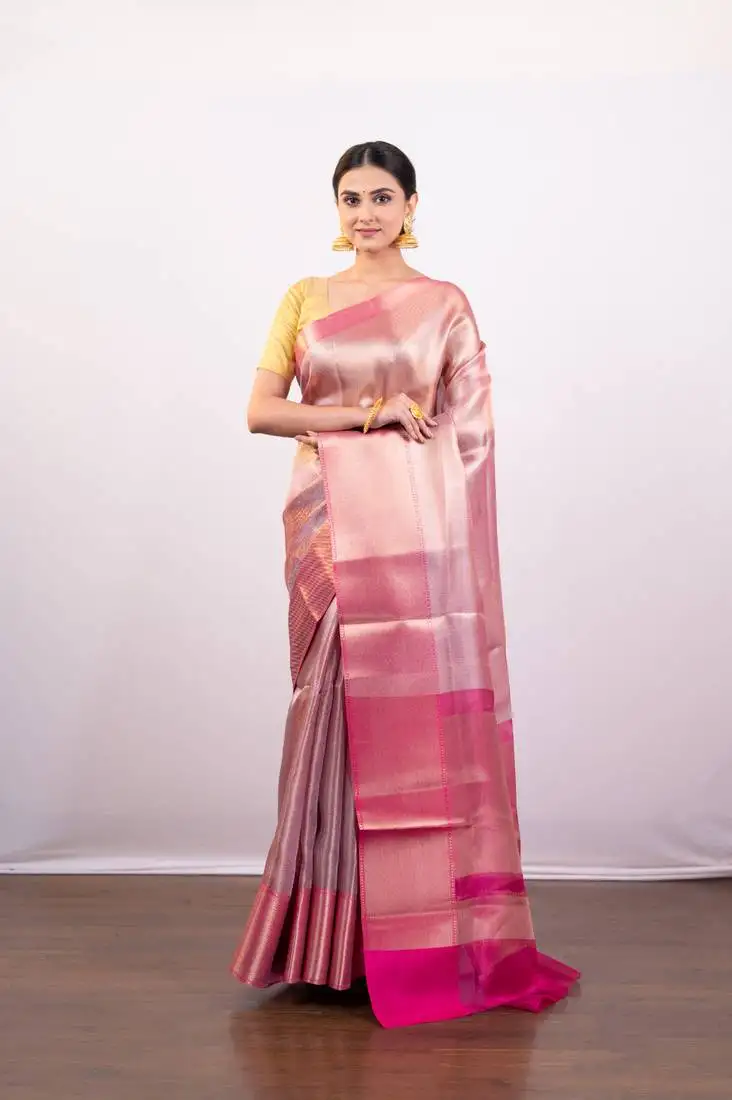 Gold and pink dual tone tissue art silk saree with delicate self-border