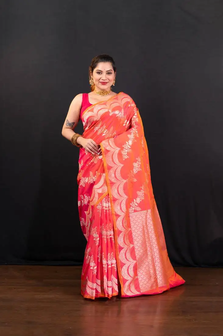 Pink dual toned pure banarasi katan silk saree with silver zari necklace border and floral motifs