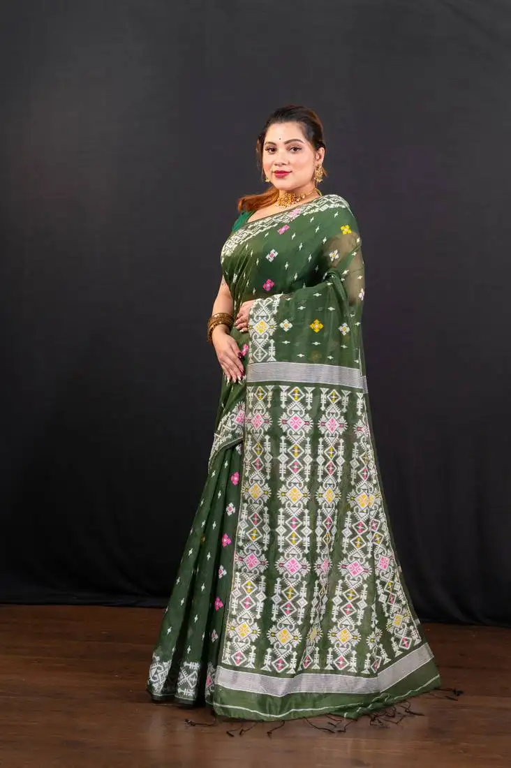 Dark green cotton jamdani saree with offwhite woven motifs