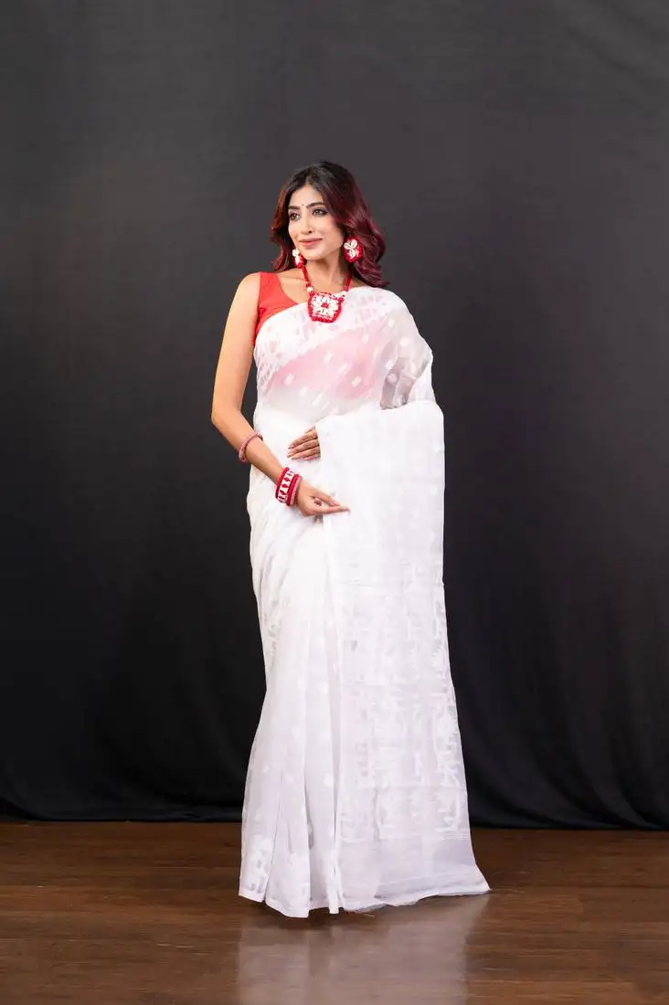White cotton jamdani saree with self woven motifs