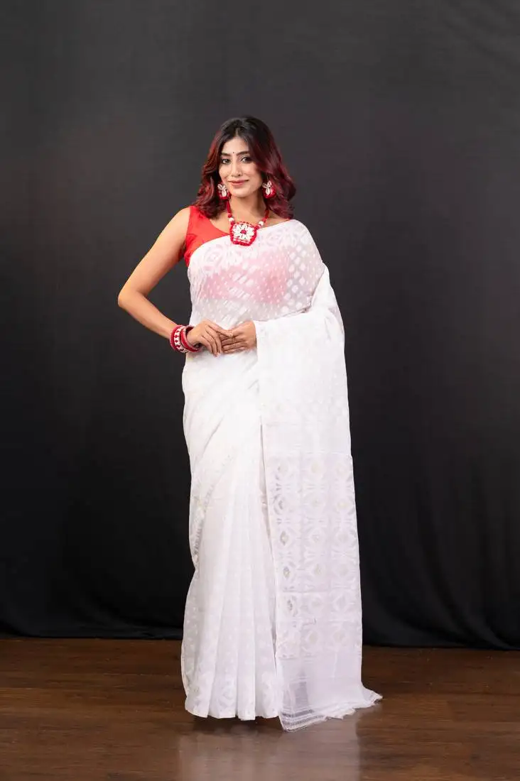 White cotton jamdani saree with self woven motifs and golden booti
