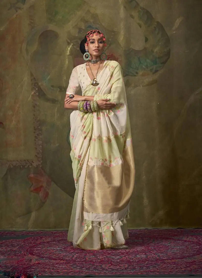 Off white & pista cotton silk with tussles on pallu rangkaat weaving saree