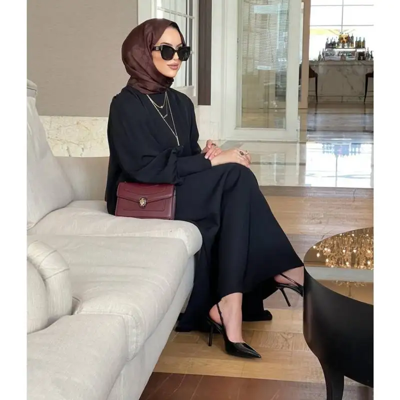 Black simple yet abaya in premium praada with cuff sleeves and matching belt