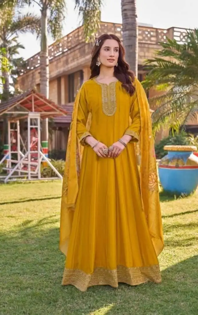 Yellow heavy silk free size embroidered anarkali gown with floral dupatta stitched