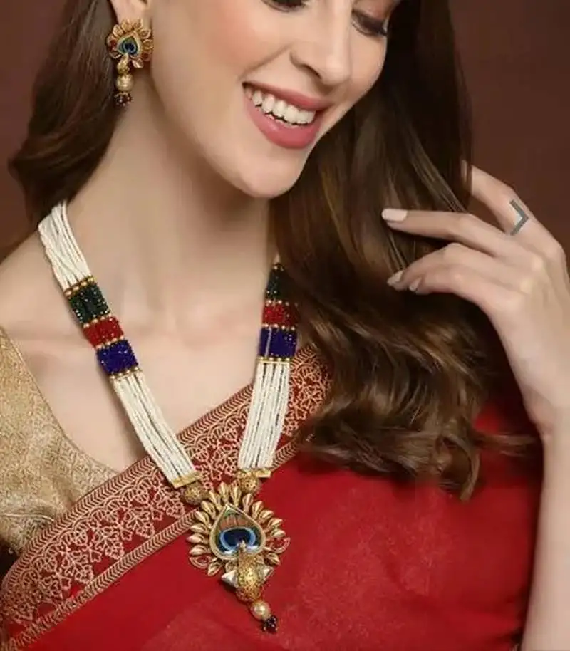 Traditional pearl rani haar with peacock pendant - multicolor beaded wedding necklace set with designer earrings