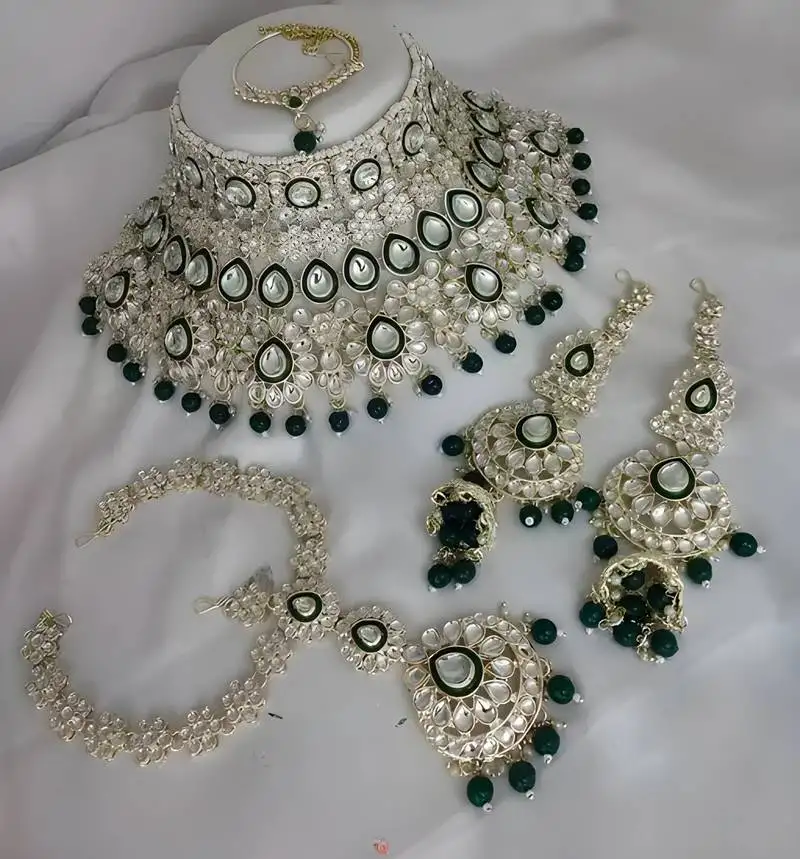 Luxurious green kundan bridal set - complete semi wedding jewelry collection with pearl embellishments