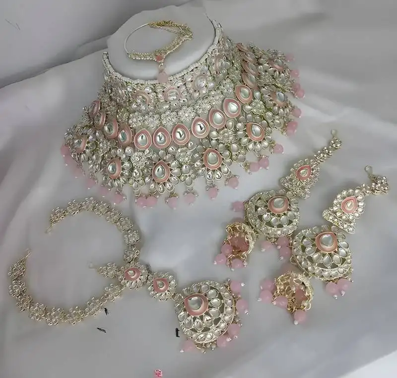 Luxurious rose quartz kundan bridal set - complete semi wedding jewelry collection with pearl embellishments