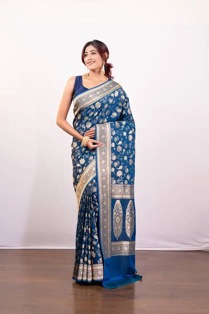 Blue pure banarasi katan silk saree with golden floral jaal motifs and golden border pallu