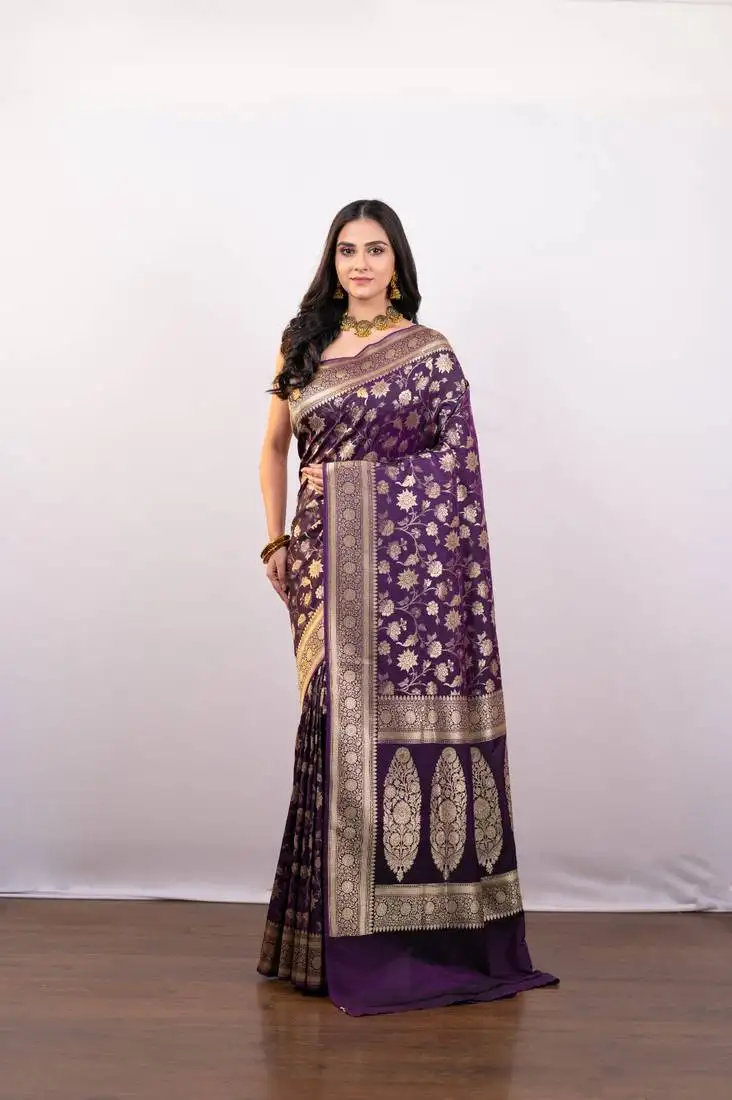 Purple pure banarasi katan silk saree with golden floral jaal motifs and golden border pallu
