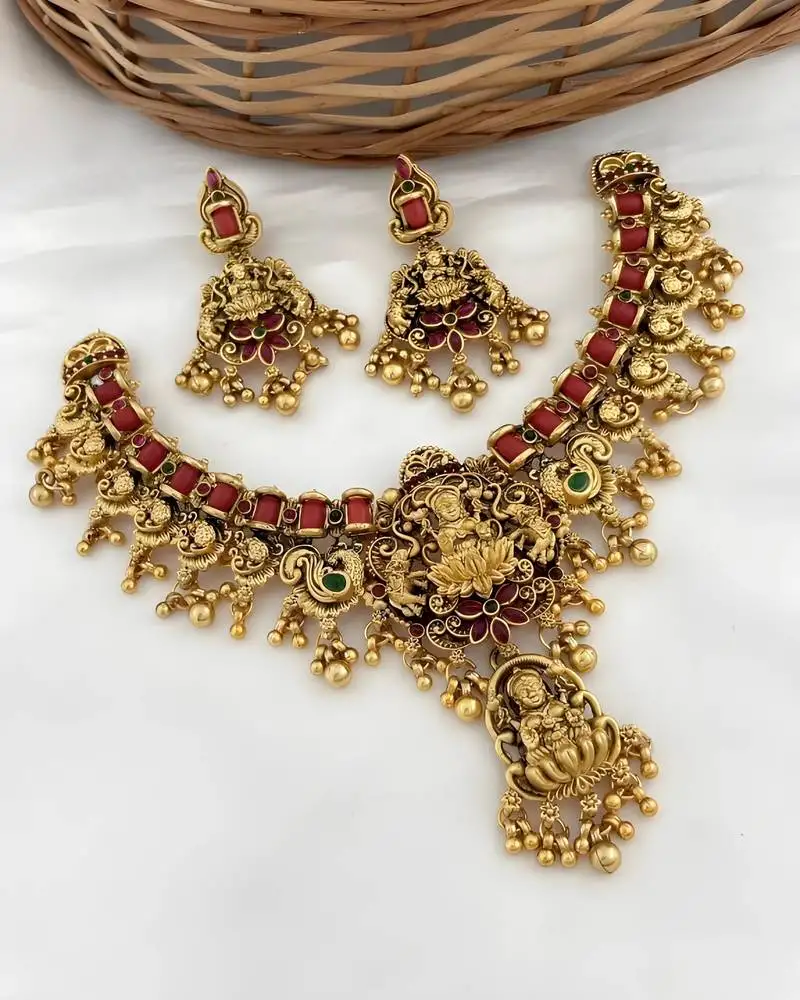 Opulent lotus lakshmi temple necklace set - antique gold kundan bridal jewelry with ruby and emerald accents