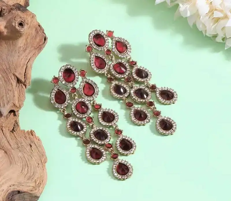 Luxurious ruby cascade earrings - crystal-embellished statement earrings for wedding & festival glamour