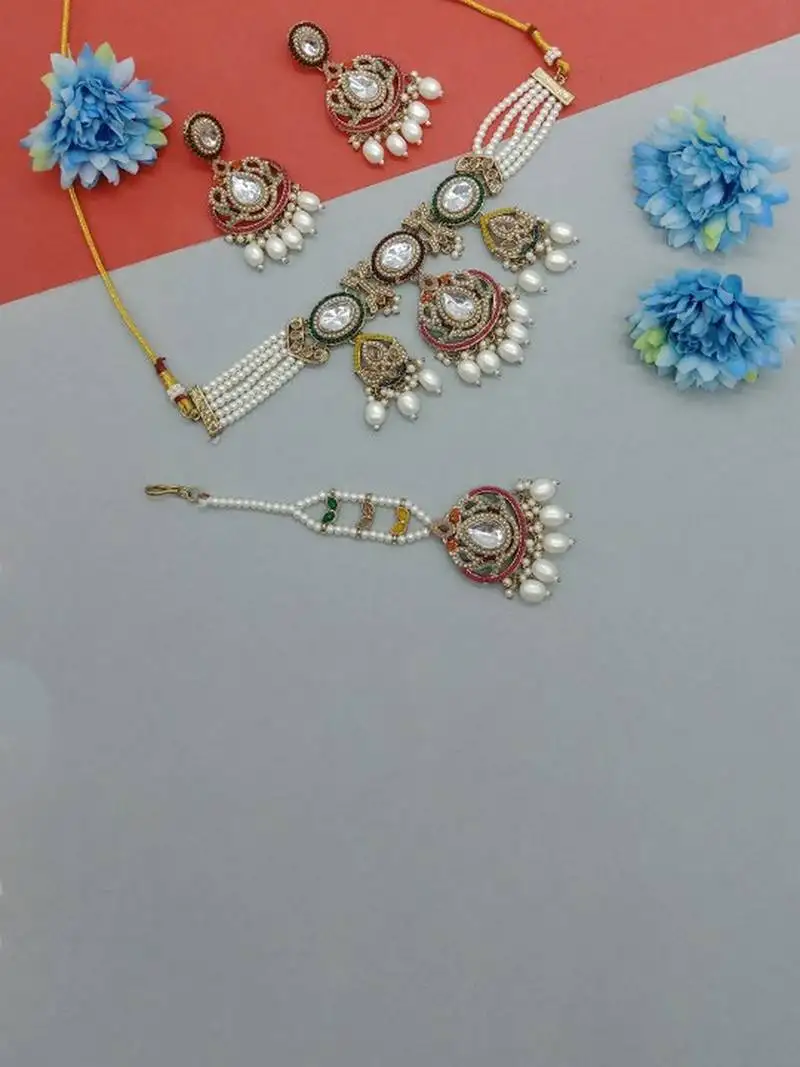 Regal pearl kundan choker jewelry set with maang tikka - traditional indian wedding & festival collection