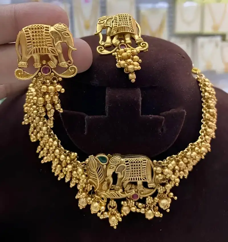 Traditional gold-plated elephant choker & earrings set - handcrafted pearl temple jewelry