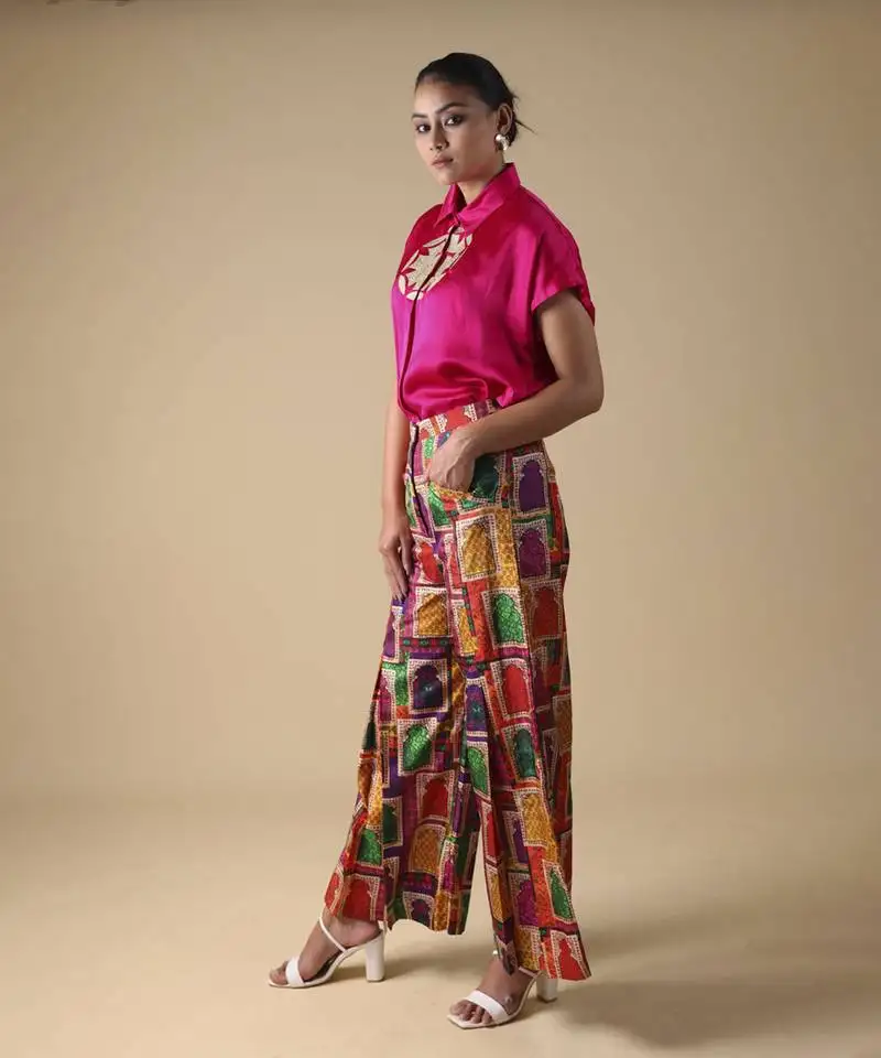 Pink hand embroidered shirt with pleated pants