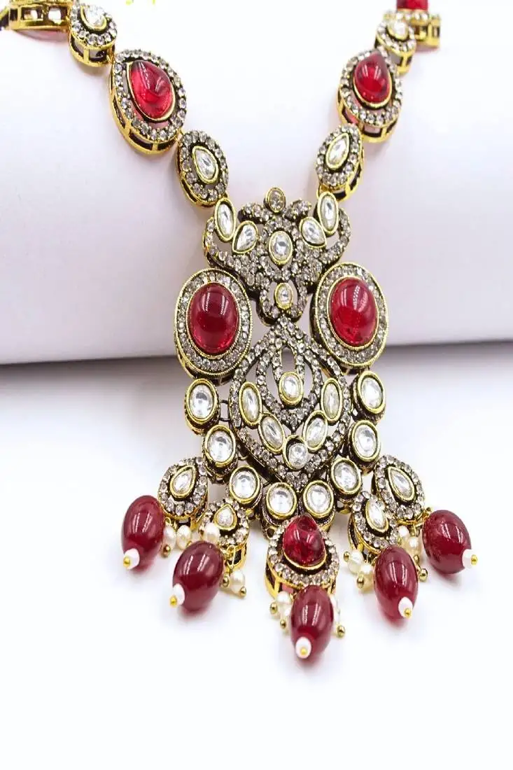 Red gold plated black rhodium moissanite kundan cz red long necklace set with maangtikka