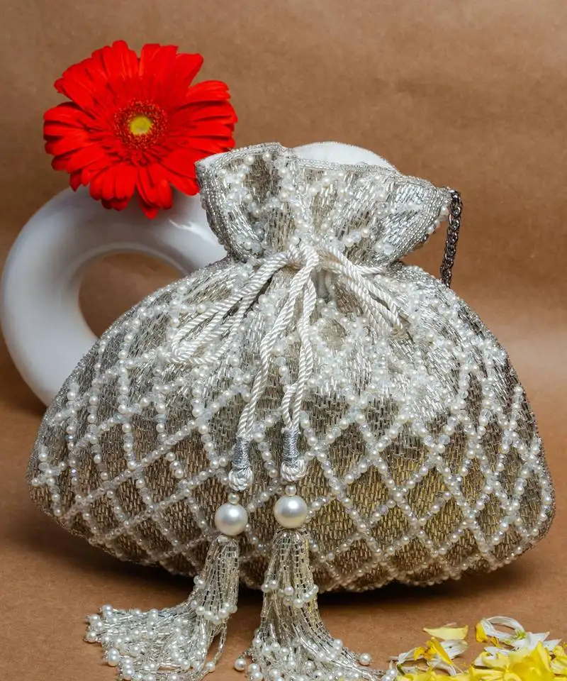 Silver cruzado white nayaab by sonia