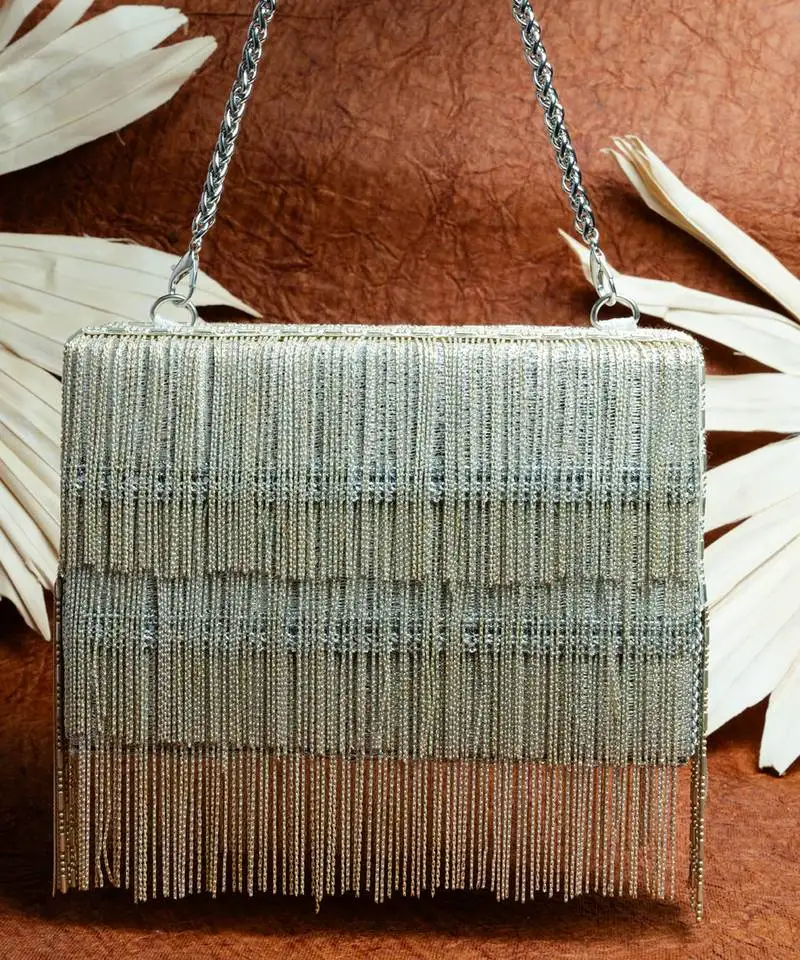 Silver hinted kasse silver nayaab by sonia