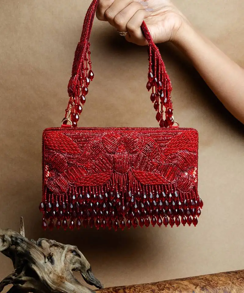 Red ornate radiance kasse crimson bloom nayaab by sonia