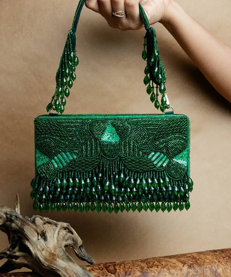 Green ornate radiance kasse emerald allure nayaab by sonia