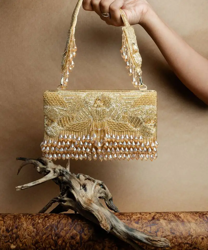 Gold ornate radiance kasse golden aura nayaab by sonia