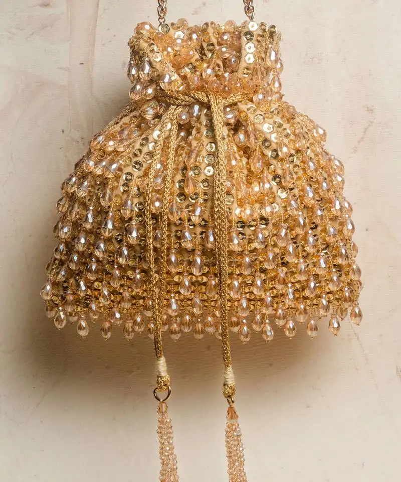 Gold pristine crystalline goldish nayaab by sonia