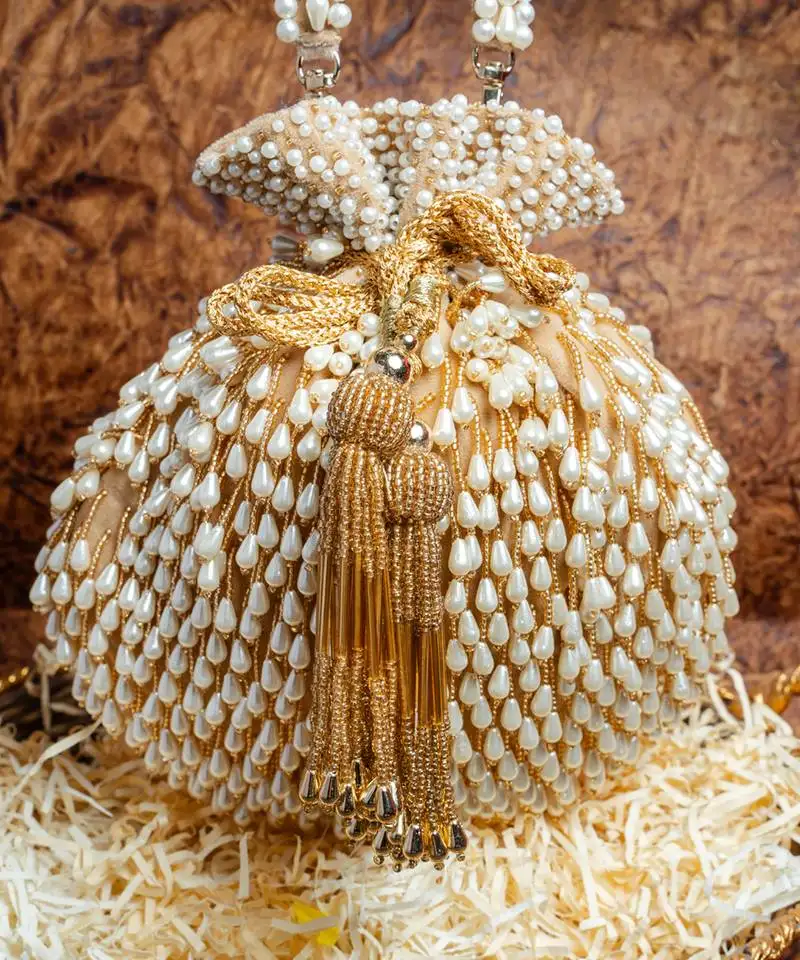 Gold pearl treasure gold nayaab by sonia