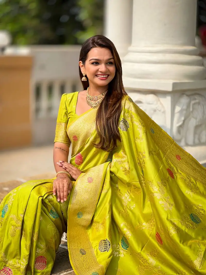 Pista green soft silk blend saree with zari weaving meenakari design