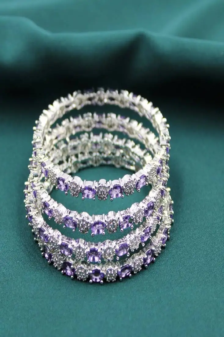 Rhodium plated zircon slide bangles set of 4