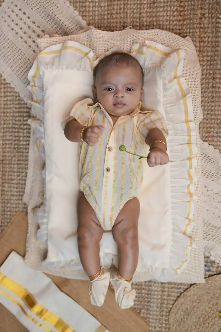 White shirt romper with shoes.