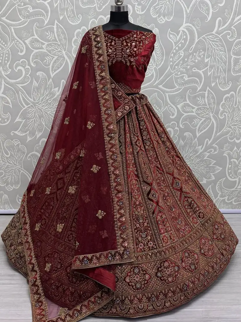 Maroon embroidered velvet bridal lehenga choli with double dupatta