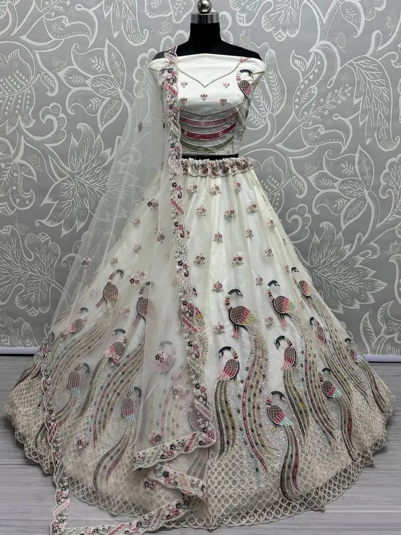 White multi-thread work net bridesmaid lehenga choli with dupatta