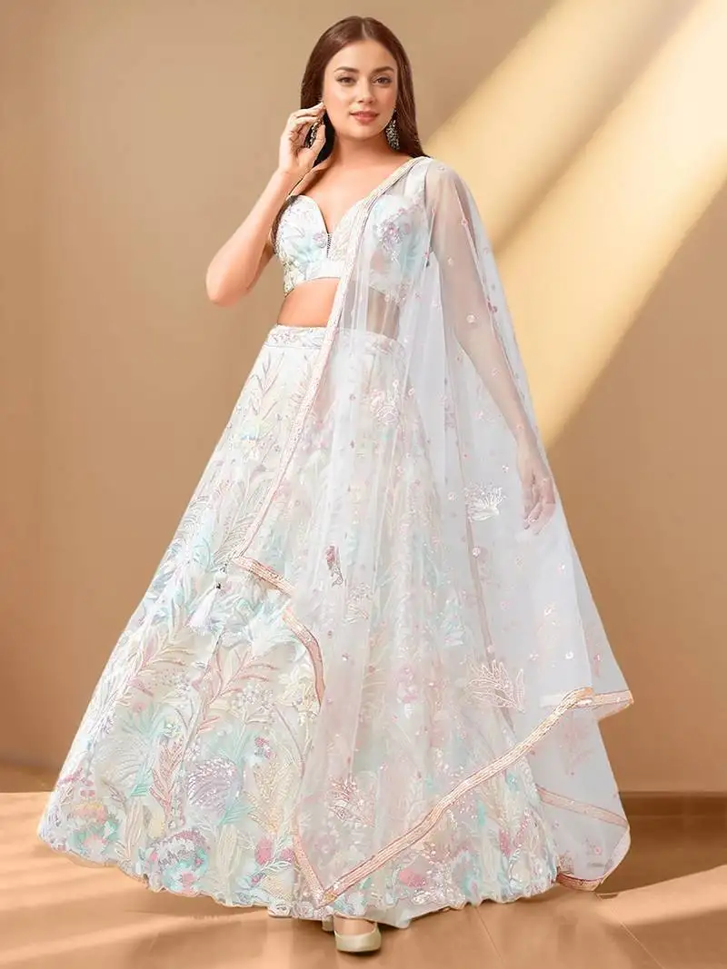Off-white sequins net reception wear lehenga choli