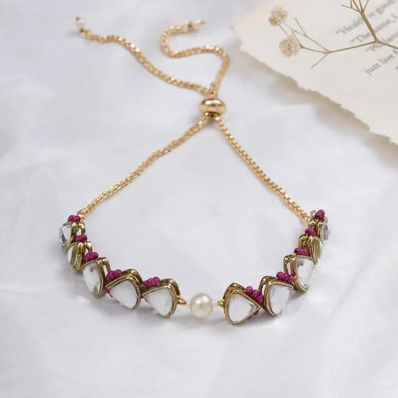 Golden triangle kundan & white pearl adjustable bracelet pink