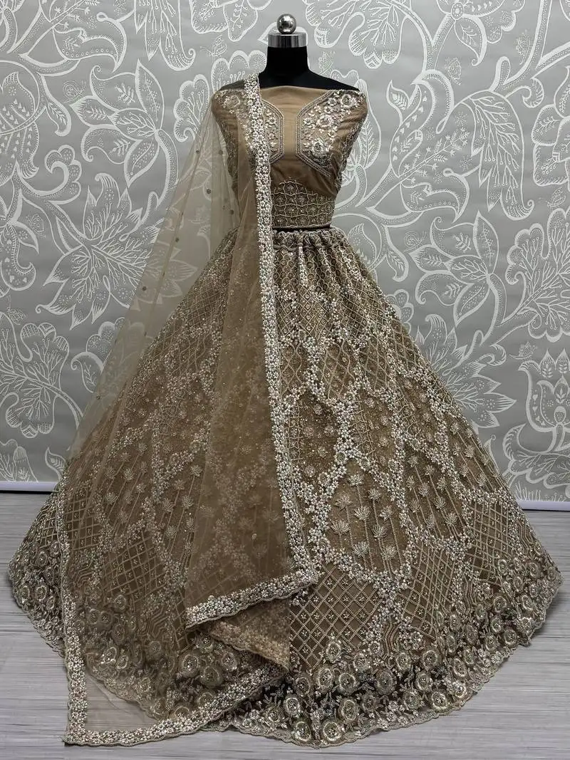 Golden thread work net wedding wear lehenga choli