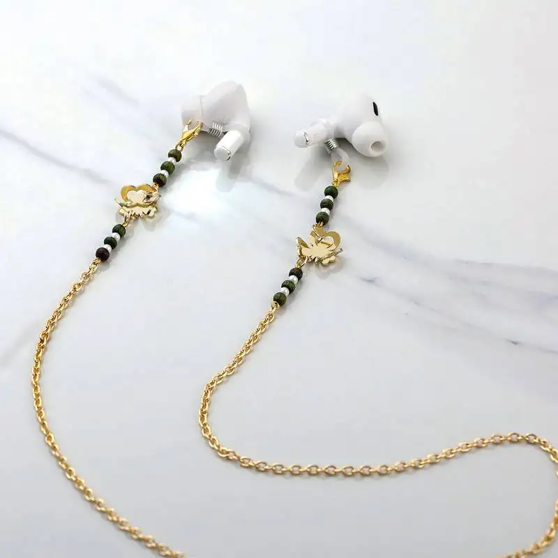 Golden flower with green beads spectacles::Air pods chain