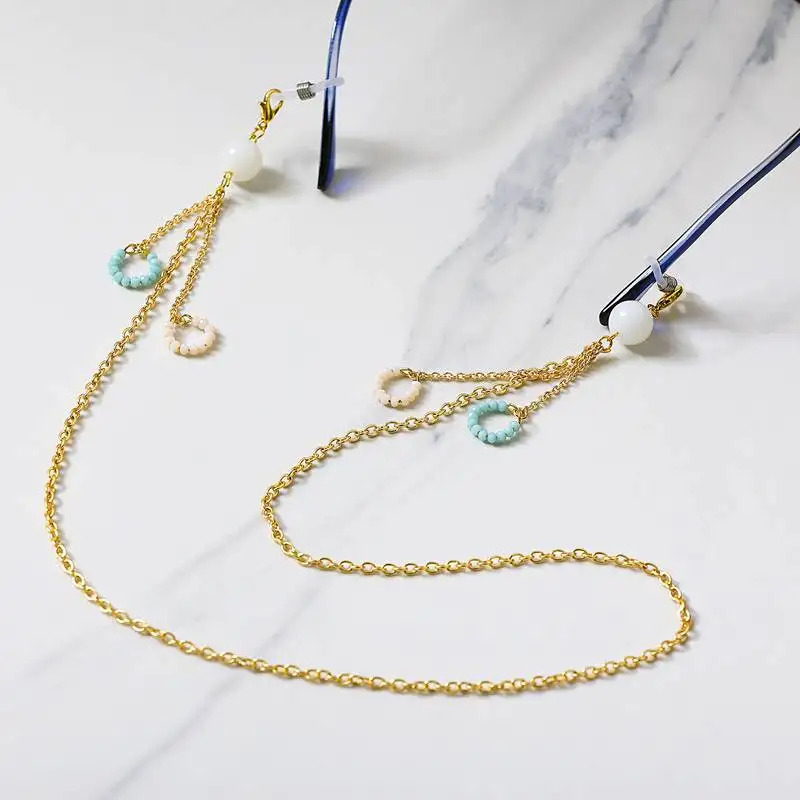 Golden chain with white & blue beads ring spectacles::Air pods chain