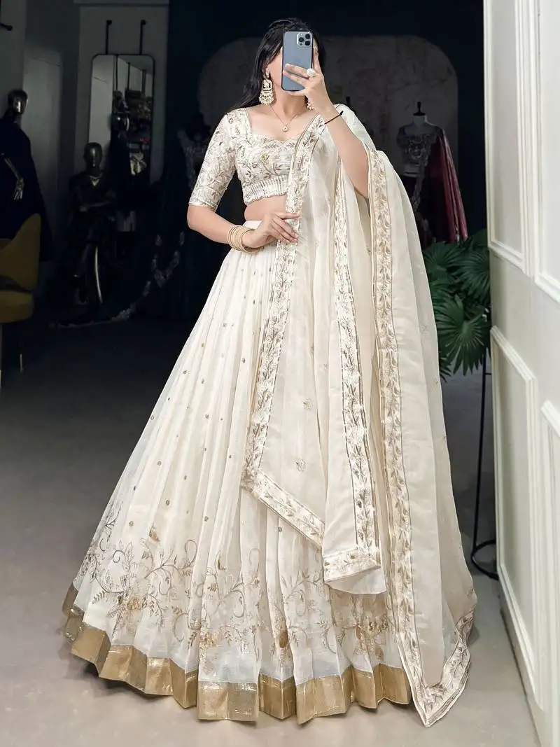 Off-white foil work silk wedding lehenga choli with dupatta