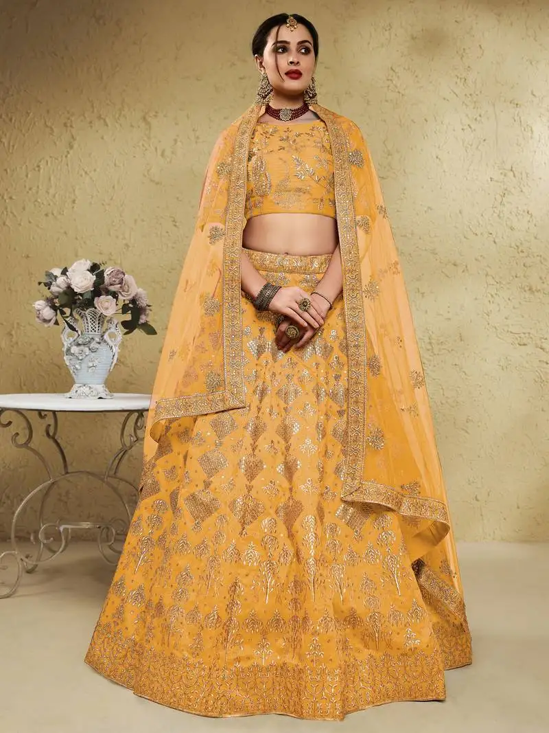 Yellow sequins silk wedding lehenga choli with net dupatta