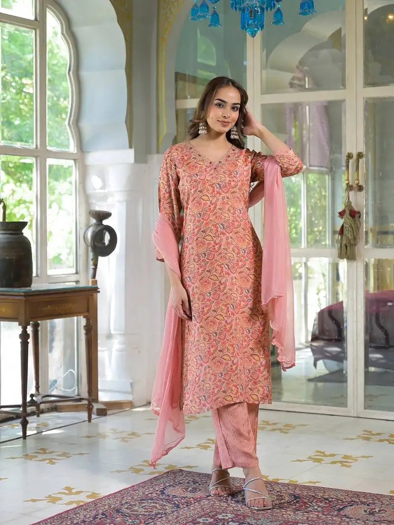 Divena peach floral print muslin embroidred kurta trouser with dupatta stitched
