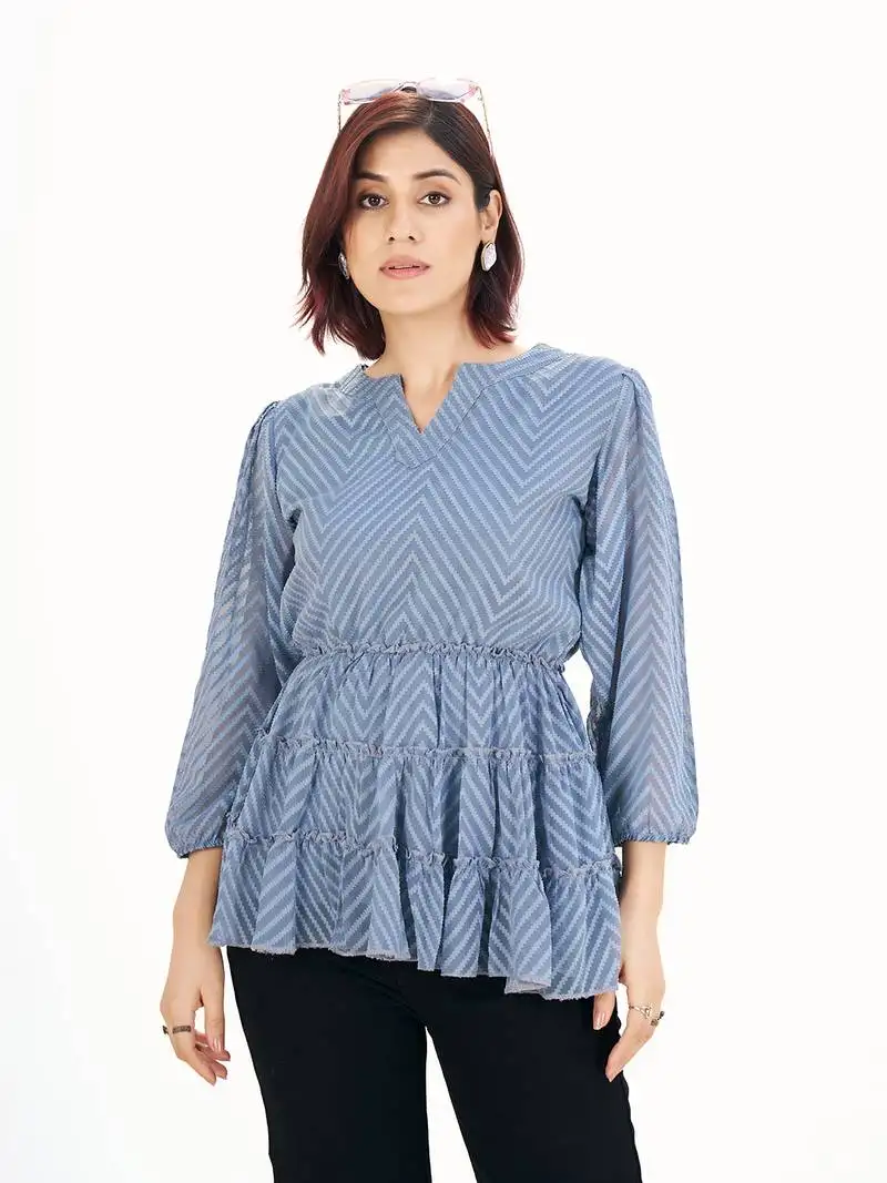 Blue self-textured puff sleeve empire top with layered detail