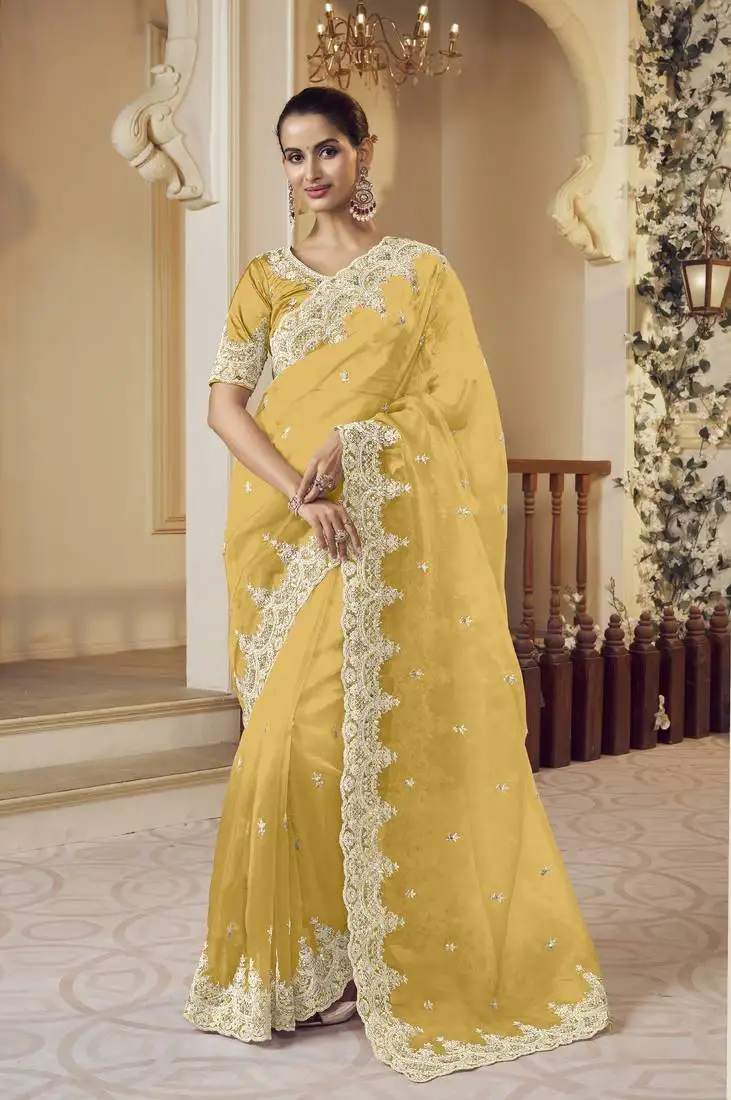 Yellow micro net party wear embroidered saree with blouse fabric