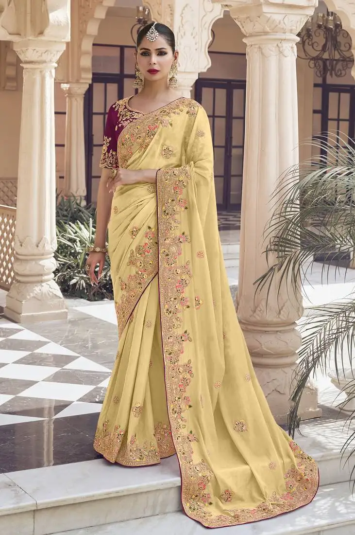 Yellow georgette party wear embroidered saree with blouse fabric
