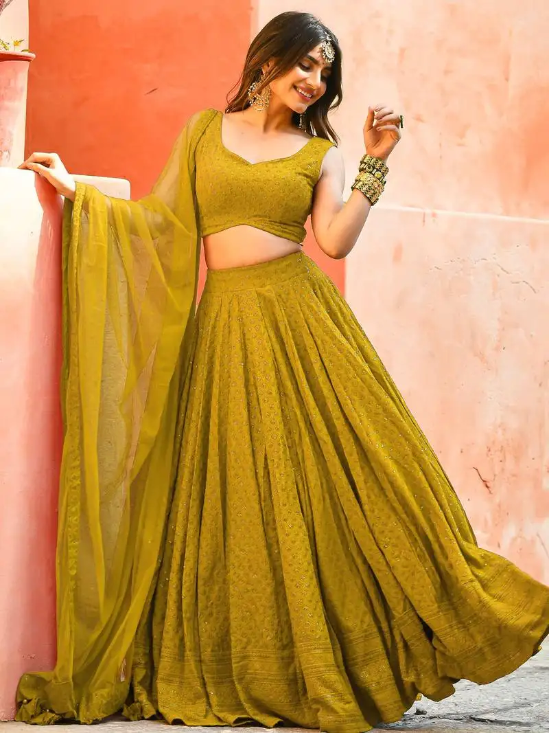 Mustard yellow sequins lehenga choli with net dupatta