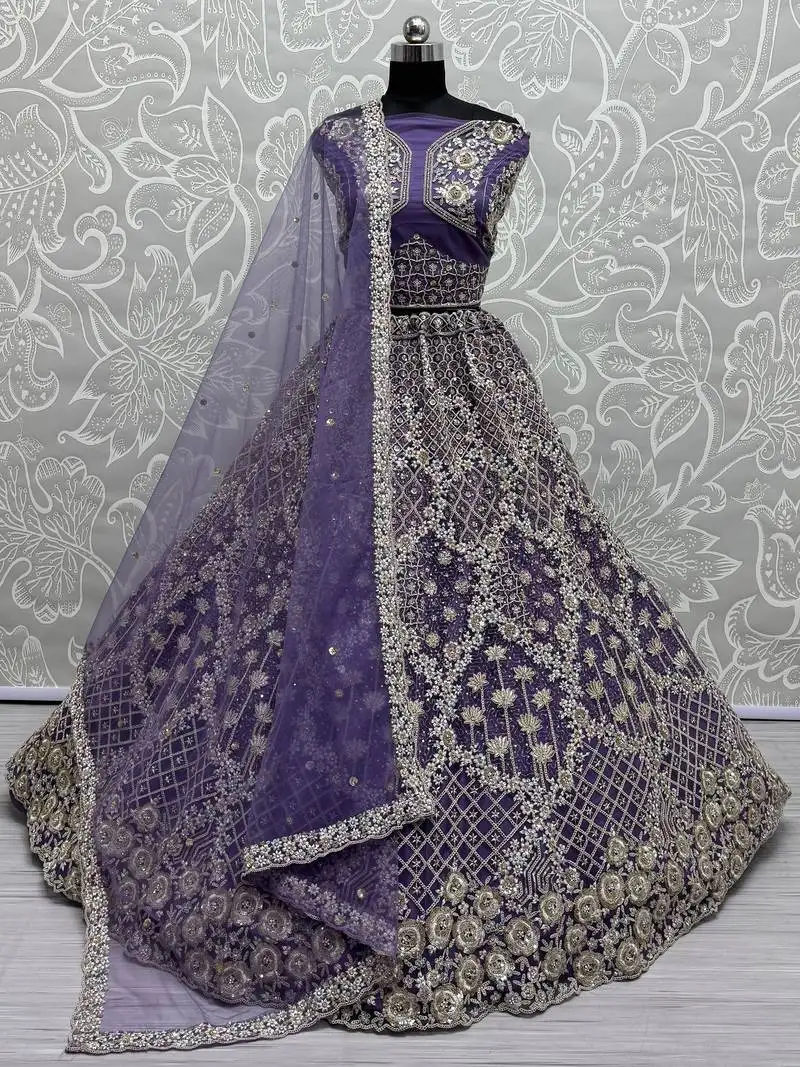 Purple thread embroidered net wedding lehenga choli