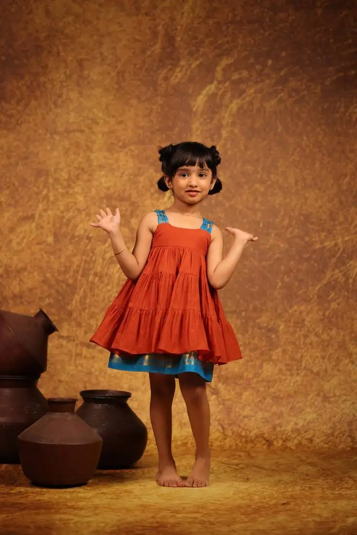 Orange cotton tiered gathered dress for girls