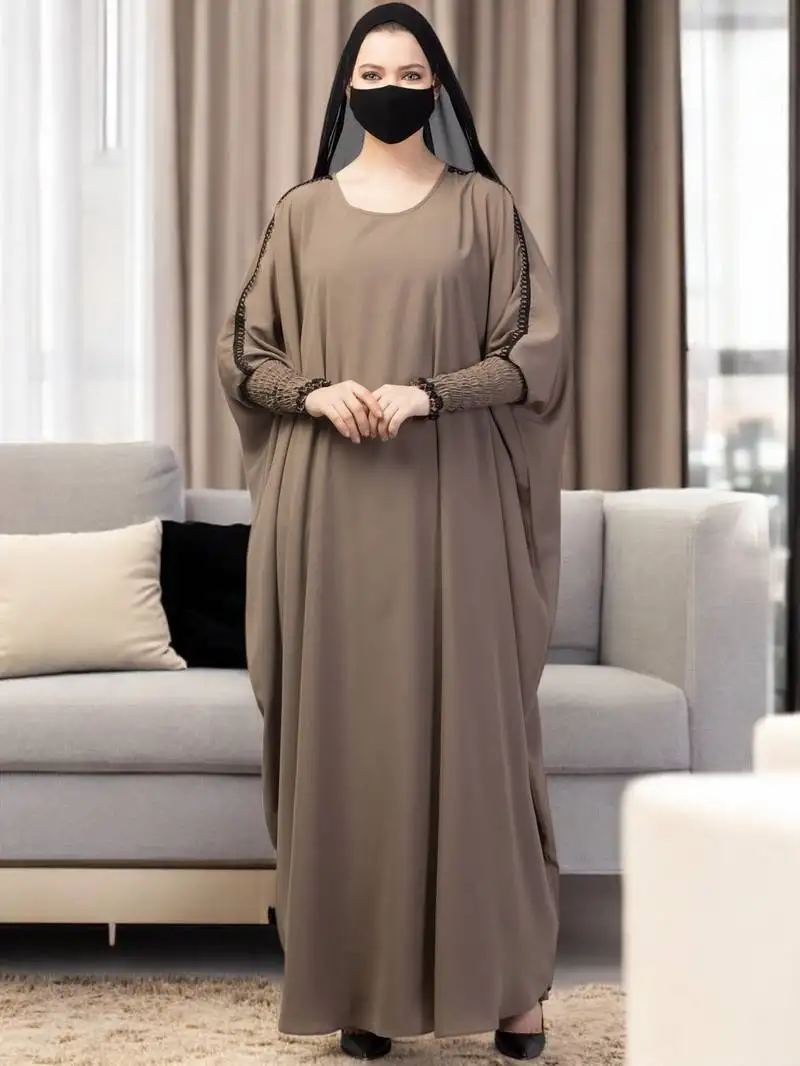 Dark-olive free size kaftan abaya with long elasticated sleeves.
