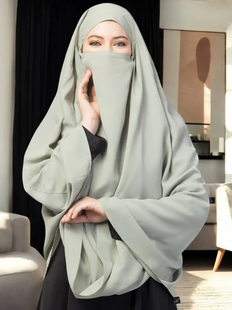Sea-green plain color khimar with attached mouthpiece.
